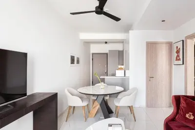 a white living room with a table and chairs at Luxury Apartment, Athens Center, 