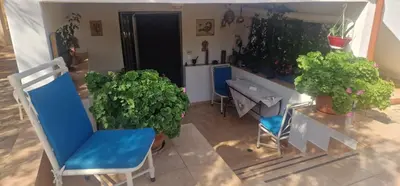 an aerial view of a room with plants and chairs at Villa Aura - Thymari in Sounio