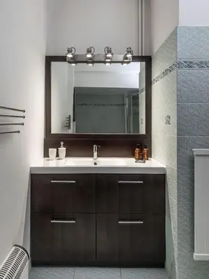 a bathroom with a sink and a mirror at Relux Sea View 2 Bedroom Apartment by BluPine in Athens