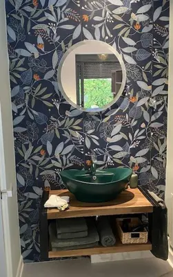 a bathroom with a green sink and a mirror at Studio for a couple in Athens