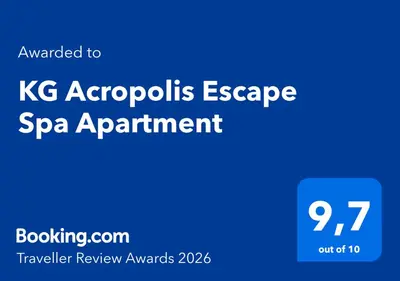 a blue sign with the words kc expedia escape spa appointment at KG Acropolis Escape Spa Apartment in Athens
