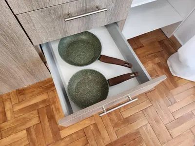 two baskets in a drawer in a cabinet at Attiki Rooftop Apartment VIPGreece in Athens