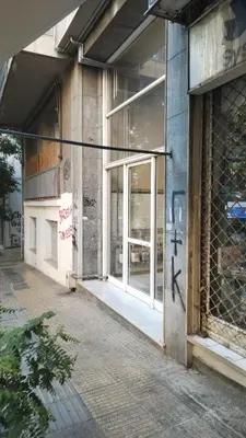 an open door of a building with graffiti on it at Comfy home 35sqm near National Garden in Athens
