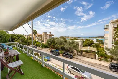 a balcony with a view of a street at Beachside Bungalows in Athens