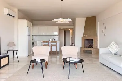 a living room with a couch and chairs and a table at Pame Rentals - 1BD Apartment with Sea View in Athens