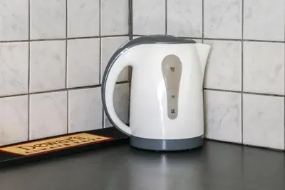 a toaster sitting on a counter in a kitchen at Loft condo next to metro station. Amazing view! in Athens