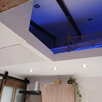 a room with a ceiling with a blue ceiling at Boutique Eptalofos 15min from airport and sea in Kouvarás