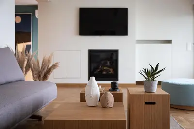 a living room with a couch and a coffee table at Glyfada Unique Residence in Athens
