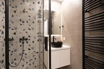 a bathroom with a sink and a shower at Luxury 4 Bedrooms Apartment Near Flisvos Marina in Piraeus