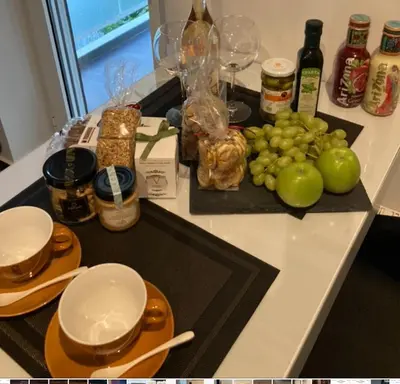 a counter top with a bunch of fruits and vegetables at Only2Suites in Athens