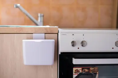 a kitchen with a stove and a sink at Luxury suites XiangBaLa Glyfada in Athens