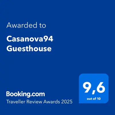 a screenshot of a cell phone with the text awarded to at Casanova94 Guesthouse in Piraeus