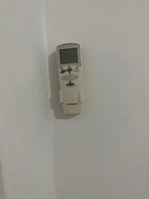 a video game system hanging on a wall at Sea view apartment steps away from the Beach Anavyssos Palaia Fokaia in Áyios Yeóryios