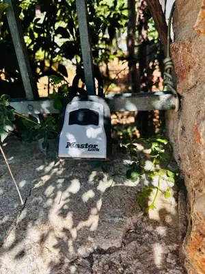 a toaster sitting on the ground next to a tree at Sea view apartment steps away from the Beach Anavyssos Palaia Fokaia in Áyios Yeóryios