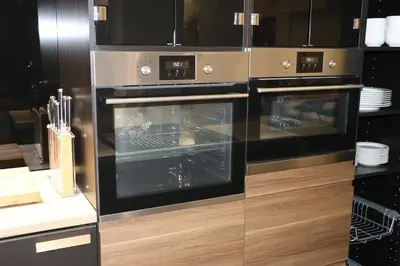 a kitchen with two ovens in a kitchen at Exzellent ApartAthens 120qm, near Metro M2 in Athens