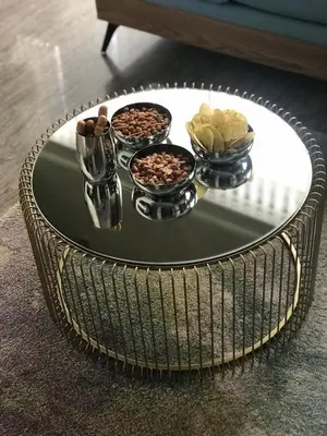 a coffee table with three bowls of food on it at Exzellent ApartAthens 120qm, near Metro M2 in Athens