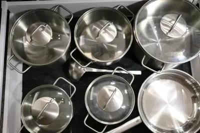 a bunch of pans sitting on top of a stove at Exzellent ApartAthens 120qm, near Metro M2 in Athens