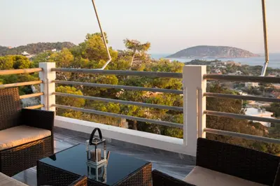 a balcony with a view of the ocean at Saronicos Gulf View in Anavissos in Anavissos