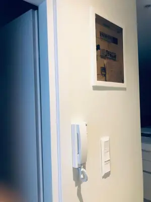a wall with a soap dispenser on a wall at SeaRenity Glyfada Ctr, 1BR, Renovated, near beach in Athens