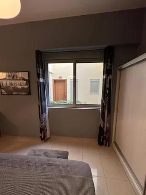 a bedroom with a bed and a window at Elegant Escapes 5 in Athens