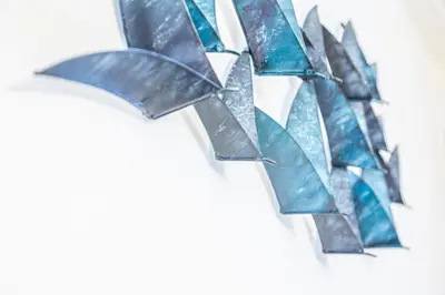 a group of glass butterflies on a wall at Unique studio at Athens Riviera 1 min from the sea in Athens