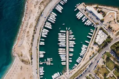 an overhead view of a marina with boats at Kreoli Suites Glyfada in Athens