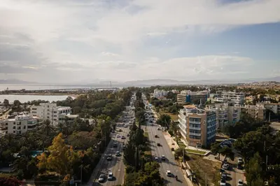 an aerial view of a city street with cars at Kreoli Suites Glyfada in Athens