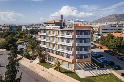 an aerial view of a hotel in a city at Kreoli Suites Glyfada in Athens