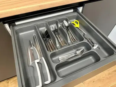 a metal tray with utensils in a kitchen sink at Relax Home In Moschato 2 VIPGreece in Piraeus