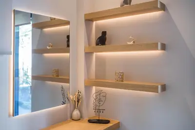 a room with wooden shelves on the wall at Amazing Stay in Athens