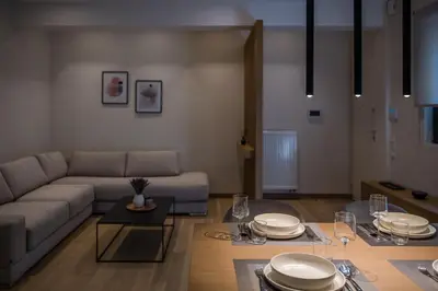 a living room with a couch and a table at Amazing Stay in Athens