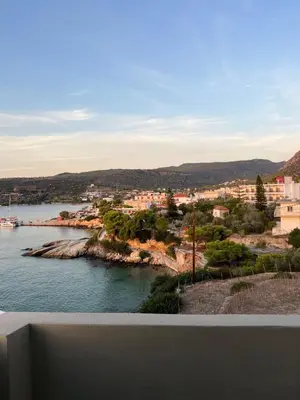 a view of a body of water with buildings at Kores Aegina in Agia Marina Aegina