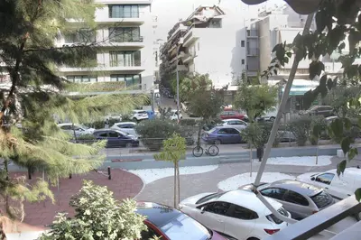 a bunch of cars parked in a parking lot at Apartamento Central - La Amistad in Athens
