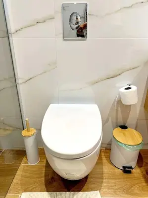 a bathroom with a white toilet in a room at Moschato New Home 3 VIPGreece in Piraeus
