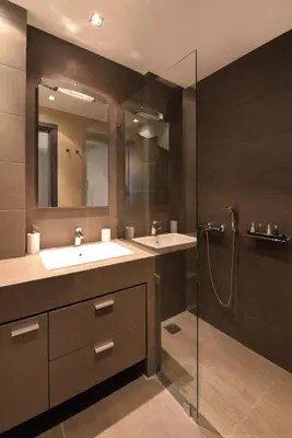 a bathroom with two sinks and a shower at Stefano's Villa Lagonissi in Lagonissi