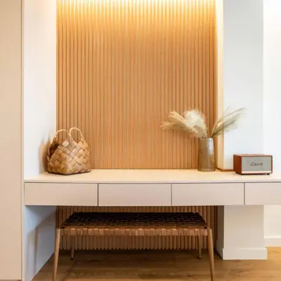 a console table with a shelf and a vase at 2-BD Luxury Apt Sea View Balcony near the beach in Athens