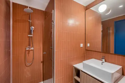 a bathroom with a sink and a shower at Kallithea Apartments by Olala Homes in Athens