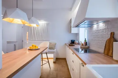 a kitchen with a counter with a bowl of fruit on it at Zelda in Athens