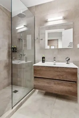 a bathroom with a sink and a shower at Limehome Athens Solonos City Center in Athens