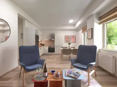 a living room with two blue chairs and a table at Prime Location in Kolonaki A Luxurious 1BR Haven in Athens