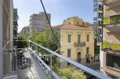 a balcony with a view of a city at Kerameikou25 small in Athens