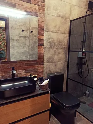 a bathroom with a sink and a toilet and a mirror at Stay in Athens - muses in Athens