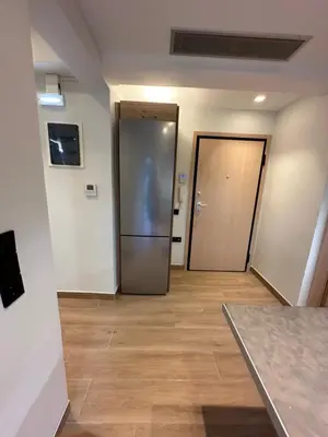 an empty room with a door and a hallway at Coastal Harmony Alimos in Athens