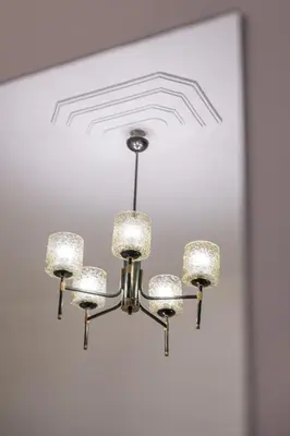 a chandelier hanging from a ceiling in a room at Pistachio in Athens