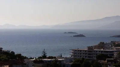 a view of the ocean from a city at Experience Penthouse by Athens Riviera Suites in Saronida