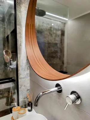 a bathroom with a sink and a mirror at Elpis' cozy & luxury apartment in Athens