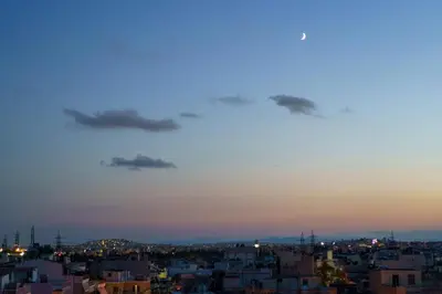 a view of a city at dusk at Angi&George house in Athens