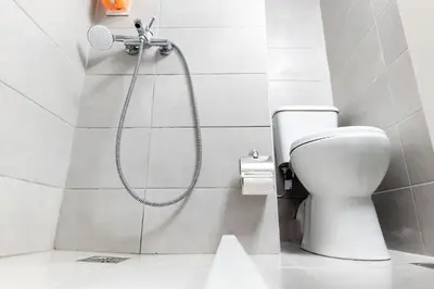 a shower in a bathroom with a toilet at Maria's Apartment δίπλα στο Νοσοκομείο Παίδων και στο Λαϊκό in Athens