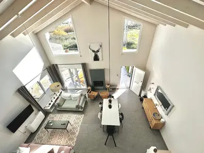 an overhead view of a living room with a couch and a tv at GS-Vibes in Porto Rafti