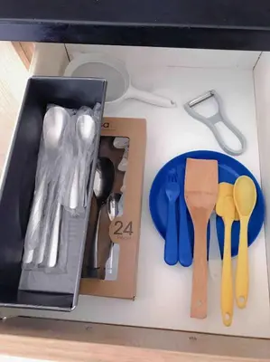 a box with some utensils and a knife and a spoon at Paleo Faliro Athens fully equipped 2 bedrooms 90 sqm big apartment 200m to Free beach in Athens